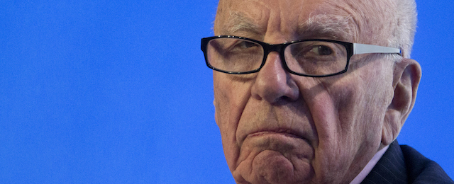 Rupert Murdoch center, Executive Chairman News Corporation, listens to questions at the B20 meeting of company CEOs in Sydney, Australia, July 17, 2014. The B20 was set up in 2010 to give policy recommendations on behalf of the international business community to the G20 member countries. (AP Photo/Jason Reed/Pool)