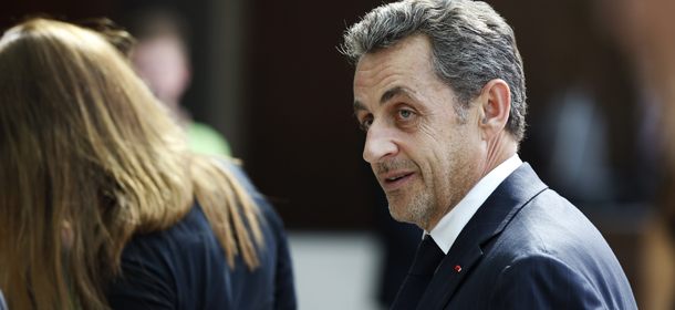 Former French president Nicolas Sarkozy arrives at the Fairmont Hotel for a private conference on June 18, 2014 in Monaco. AFP PHOTO / VALERY HACHE (Photo credit should read VALERY HACHE/AFP/Getty Images)