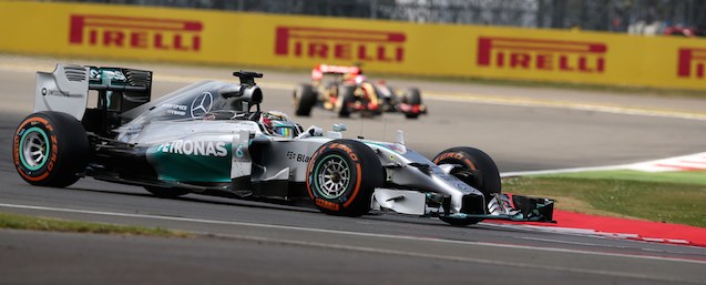 Mercedes-AMG's British driver Lewis Hamilton leads the race during the British Formula One Grand Prix at the Silverstone circuit in Silverstone on July 6, 2014. AFP PHOTO / ANDREW YATES (Photo credit should read ANDREW YATES/AFP/Getty Images)