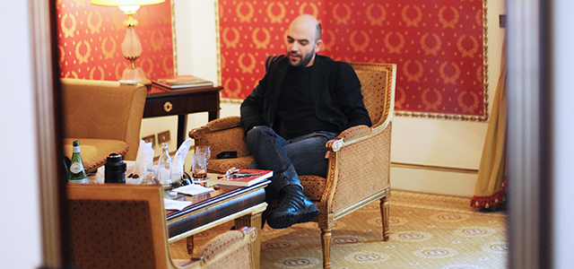 Italian writer Roberto Saviano gives an interview on March 17, 2010 in Rome. Saviano, 29, whose book "Gomorrah" has been translated into 42 languages, has lived under police protection for two years. The screen version of "Gomorrah," directed by Matteo Garrone, won second prize at the 2008 Cannes film festival and was in the running for an Oscar. His book, exposes the workings of the powerful Naples mafia, the Camorra. AFP PHOTO / CHRISTOPHE SIMON (Photo credit should read CHRISTOPHE SIMON/AFP/Getty Images)