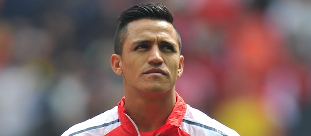 Arsenal's Chilean midfielder Alexis Sanchez lines up before kick off of the FA Community Shield football match between Arsenal Manchester City at Wembley Stadium in north London on August 10, 2014. AFP PHOTO / GLYN KIRK -- NOT FOR MARKETING OR ADVERTISING USE / RESTRICTED TO EDITORIAL USE (Photo credit should read GLYN KIRK/AFP/Getty Images)