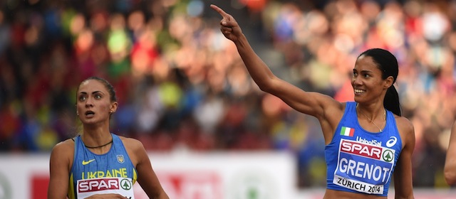 Italy's Libania Grenot (R) celebrates winning the Women's 400m final ahead of Ukraine's Olha Zemlyak (L) during the European Athletics Championships at the Letzigrund stadium in Zurich on August 15, 2014. AFP PHOTO / OLIVIER MORIN (Photo credit should read OLIVIER MORIN/AFP/Getty Images)