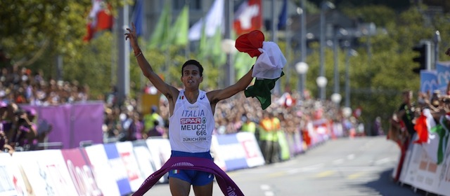 Italyian athlete Daniele Meucci celebrates his victory after crossing the finish line in the Men's Marathon during the European Athletics Championships in Zurich on August 17, 2014. AFP PHOTO / OLIVIER MORIN (Photo credit should read OLIVIER MORIN/AFP/Getty Images)