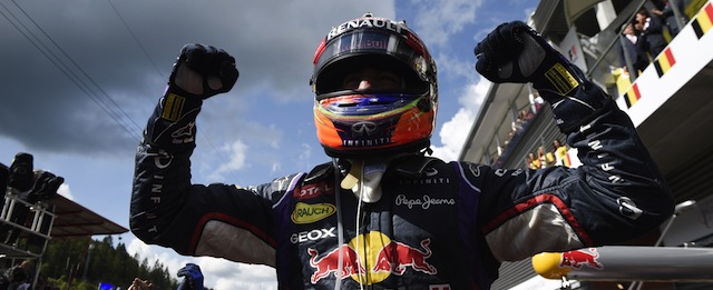 Red Bull Racing's Australian driver Daniel Ricciardo celebrates in the parc ferme at the Spa-Francorchamps circuit in Spa on August 24, 2014 after the Belgium Formula One Grand Prix. AFP PHOTO / TOM GANDOLFINI (Photo credit should read Tom Gandolfini/AFP/Getty Images)