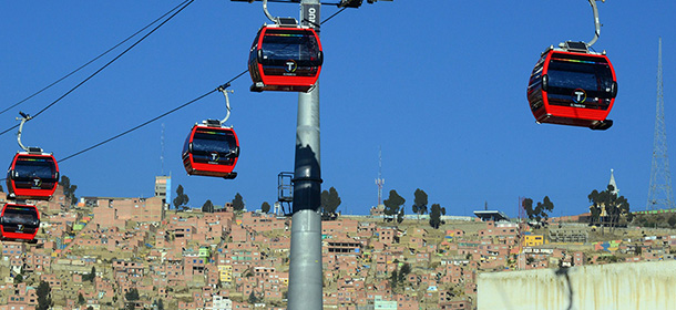 View of the first metropolitan cable railway --linking El Alto with La Paz-- during its inauguration on May 30, 2014. AFP PHOTO / AIZAR RALDES (Photo credit should read AIZAR RALDES/AFP/Getty Images)