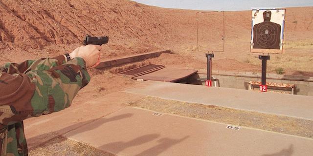 370534 05: A student practices, January 23, 2000, at a shooting range during the Covert Ops training course in Tucson, AZ. For $3,700 anyone can live the life as a secret agent at the world's only spy training facility open to the paying public. The three day training includes fighting terrorists, rescuing hostages, evading a car ambush, leading midnight raids, learning combat pistol shooting and self defense. (Photo by Dan Callister/Online USA)