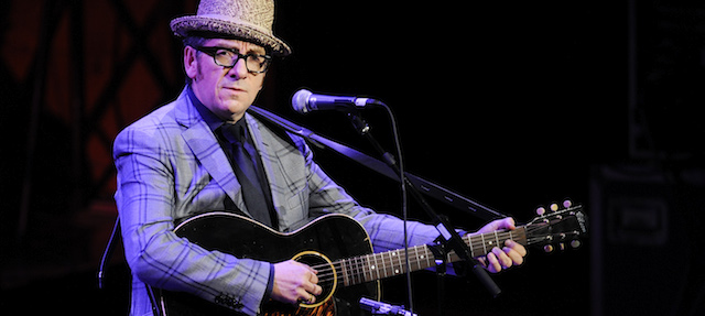 Singer Elvis Costello performs at "A Celebration of Paul Newman's Dream" to benefit "SeriousFun" an association of Hole in the Wall Camps at Avery Fisher Hall on Monday, April 2, 2012 in New York. (AP Photo/Evan Agostini)