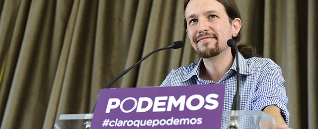 Leader of Podemos, a left-wing party that emerged out of the "Indignants" movement, Pablo Iglesias speaks during a press conference in Madrid on 2014 to speak about the party's eight percent result in last weekend's European elections. Podemos' eight percent win in last weekend's European elections, gave them five seats in the European Parliament. Although they still have a long way to go to really trouble Spain's establishment, the result took many observers by surprise since opinion polls had forecast only a two or three percent vote share for the party. AFP PHOTO / GERARD JULIEN (Photo credit should read GERARD JULIEN,GERARD JULIEN/AFP/Getty Images)