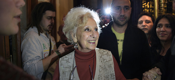 Estela de Carlotto (C) the president of Abuelas de Plaza de Mayo (Grandmothers of Plaza de Mayo), an association that seeks to reunite babies stolen during the military regime (1976-1983) with their biological parents or relatives, celebrates after announcing the recovery of her grandson Guido --the son of her daughter Laura missing in 1976 and the 114th person identified by the group-- in Buenos Aires on August 5, 2014. A relative of de Carlotto said the identity of her grandson was confirmed through genetic testing. AFP PHOTO / DANIEL GARCIA (Photo credit should read DANIEL GARCIA/AFP/Getty Images)
