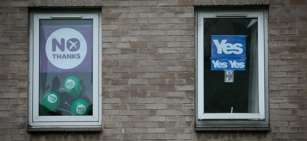 EDINBURGH, SCOTLAND - SEPTEMBER 16: Yes and No posters are seen in a flat in Edinburgh on September 16, 2014 in Edinburgh, Scotland. Yes and No supporters are campaigning in the last two days of the referendum to decide if Scotland will become an independent country. (Photo by Matt Cardy/Getty Images)
