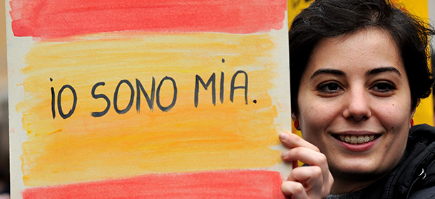 A woman holds a banner reading ''I decide'' during a demonstration in central Rome against a reform of the Spain's abortion law proposed by the conservative government on February 1 , 2014. They support thousands of pro-choice campaigners who converged on the Spanish capital today to voice their opposition to a government plan to restrict access to abortion in the mainly Catholic country.
AFP PHOTO / TIZIANA FABI (Photo credit should read TIZIANA FABI/AFP/Getty Images)