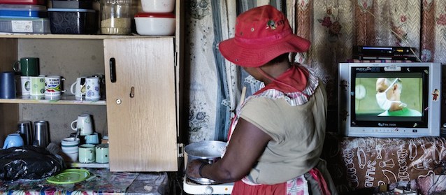 The wife of a striking miner cooks dinner at an impoverished informal camp just outside the South African Platinum hub of Marikana April 2, 2014.Government mediated talks - -that stalled through most of March -- have achieved little but widened the gap between the defiant union and the employers, Lonmin-- the world top three platinum producer with the miners and their families bearing most the brunt of the work stoppage. Over 80,000 workers downed tools across South Africa's platinum industry on January 23, holding out for a doubling of their entry-level salary to 12,500 rand ($1,170) a month.
AFP PHOTO/MARCO LONGARI (Photo credit should read MARCO LONGARI/AFP/Getty Images)