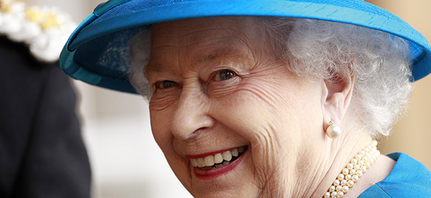 Britain's Queen Elizabeth II smiles to the media as she arrives at Hillsborough Castle, Northern Ireland, Monday, June, 23, 2014. The Queen and the Duke of Edinburgh arrived in Northern Ireland for the beginning of a three day visit. (AP Photo/Peter Morrison)