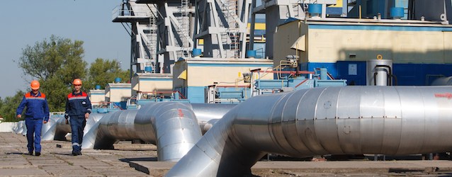 An employee walks on gas metering station "Uzhgorod" near the Chaslivci village, not far from western Ukrainian city of Uzhgorod, Transcarpathian region on May 21, 2014. The European Union called Wednesday on Russia to live up to its commitment to ensure continued gas supplies to Europe via Ukraine as long as talks on their future continued. With Russian gas giant Gazprom warning it may halt shipments to Ukraine on June 3 unless its bills are paid, European Commission head Jose Manuel Barroso told Russian President Vladimir Putin it was "imperative" that negotiations continued. AFP PHOTO/ ALEXANDER ZOBIN (Photo credit should read ALEXANDER ZOBIN/AFP/Getty Images)