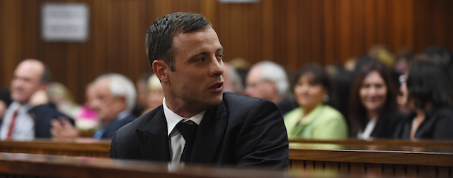 BY COURT ORDER, THIS IMAGE IS FREE TO USE. PRETORIA, SOUTH AFRICA - SEPTEMBER 11: Oscar Pistorius at the Pretoria High Court on September 11, 2014, in Pretoria, South Africa. Pistorius, stands accused of the murder of his girlfriend, Reeva Steenkamp, on February 14, 2013. This is his' official trial, the result of which will determine the paralympian athlete's fate. Judge Masipa has began delivering her verdict. (Photo Phill Magakoe/Independent Newspapers/Gallo Image/Getty Images)