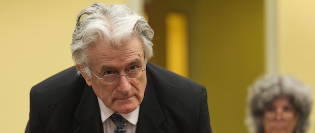 Bosnian Serb wartime leader Radovan Karadzic appears in the courtroom for his appeals judgement at the International Criminal Tribunal for Former Yugoslavia (ICTY) in The Hague, The Netherlands, on July 11 2013. AFP PHOTO/ POOL/MICHAEL KOOREN (Photo credit should read MICHAEL KOOREN/AFP/Getty Images)