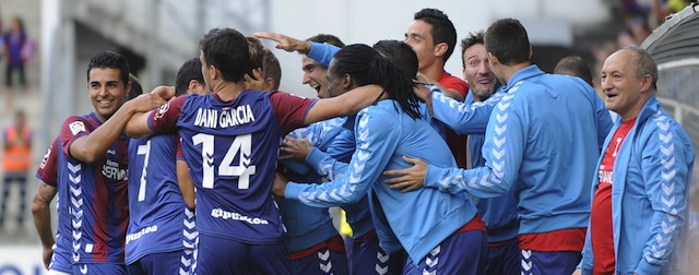 Eibar's palyers celebrate after scoring during the Spanish league football match SD Eibar vs Real Sociedad at the Ipurua stadium in Eibar on August 24, 2014. AFP PHOTO/ RAFA RIVAS (Photo credit should read RAFA RIVAS/AFP/Getty Images)