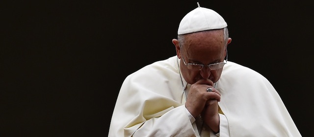 Pope Francis leads a vigil prayer in preparation for the Synod on the Family on October 4, 2014 at St Peter's square at the Vatican. AFP PHOTO / GABRIEL BOUYS (Photo credit should read GABRIEL BOUYS/AFP/Getty Images)