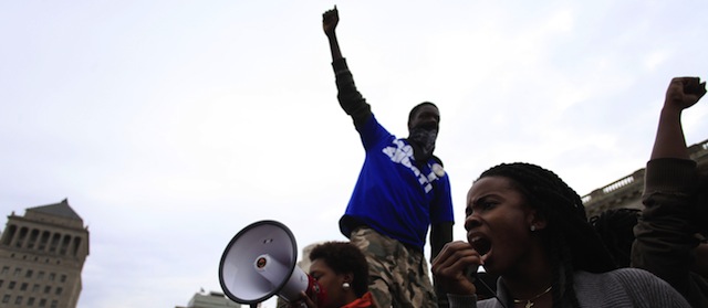 Demonstrators protest the shooting death of Michael Brown on October, 11 2014 in St. Louis, Missouri. Civil rights organizations, protest groups and people from around the country were protesting the August 9 shooting of Brown, 18, which involved Ferguson Police officer Darren Wilson in the suburban town of Ferguson near St. Louis. AFP PHOTO/Joshua Lott (Photo credit should read Joshua LOTT/AFP/Getty Images)