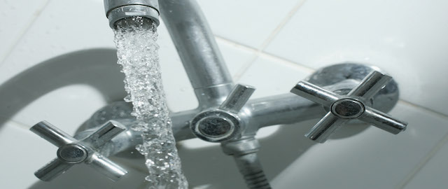 BERLIN - JANUARY 12: Water flows from a bathroom tap January 12, 2007 in Berlin, Germany. (Photo Illustration by Sean Gallup/Getty Images)