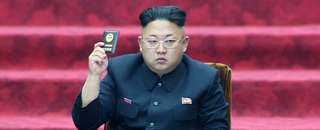 In this Wednesday, April 9, 2014 image made from video, North Korean leader Kim Jong Un holds up a parliament membership certificate during the Supreme People's Assembly in Pyongyang, North Korea. North Korea is declaring that the upcoming release of "The Interview," a comedy film about a plot to assassinate Kim Jong Un, would be an act of war. From over-the-top villainous roles in films such as "Olympus Has Fallen" and "Die Another Day" to madcap impersonations in series like "30 Rock" and "MADtv," North Korea and its dictators frequently turn up as both pop-culture punching bags and punchlines. (AP Photo/KRT via AP Video, File) TV OUT, NORTH KOREA OUT