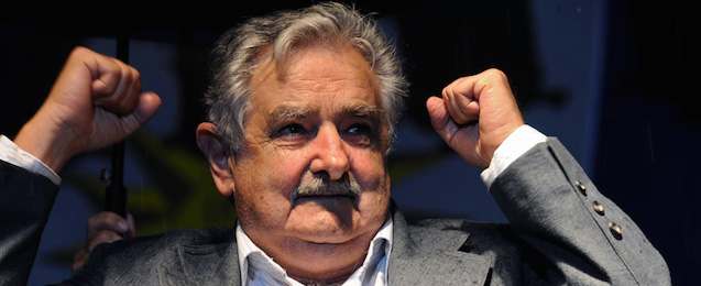 Uruguayan president elect, former guerrilla Jose Mujica of the ruling Frente Amplio (Broad Front) party, celebrates his victory in the presidential run-off elections in Montevideo on November 29, 2009. Mujica, a blunt-spoken leftist former rebel, won Uruguay's presidential runoff on Sunday, garnering some 51 percent of the vote. AFP PHOTO/Pablo PORCIUNCULA (Photo credit should read PABLO PORCIUNCULA/AFP/Getty Images)