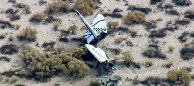 This image from video by KABC TV Los Angeles shows wreckage of what is believed to be SpaceShipTwo in Southern California's Mojave Desert on Friday, Oct. 31, 2014. A Virgin Galactic space tourism rocket exploded after taking off on a test flight, a witness said Friday. (AP Photo/KABC TV)