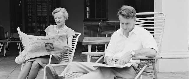 Ian Smith (1919 - 2007), the Prime Minister of Rhodesia, and his wife Janet relax at their home in a suburb of Salisbury (later Harare), the capital of Southern Rhodesia (later Zimbabwe), November 1964. She is reading The Rhodesia Herald. (Photo by Reg Lancaster/Express/Getty Images)