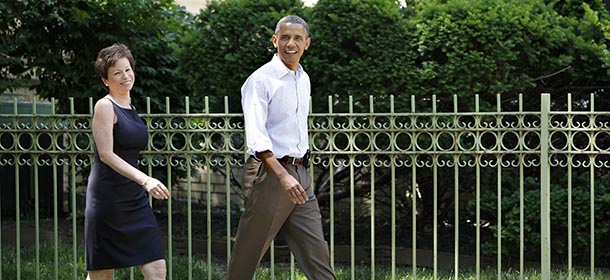 US President Barack Obama walks with senior adviser Valerie Jarrett in the Hyde Park neighborhood of Chicago, Illinois on June 2, 2012. Obama stepped up pressure on Congress Saturday, urging lawmakers to pass a string of bills designed to help grow the economy and create more jobs -- after a new uptick in the nation's unemployment rate. In his weekly radio and Internet address, the president noted that the US economy, while recovering, was still facing "some serious headwinds." AFP PHOTO/YURI GRIPAS (Photo credit should read YURI GRIPAS/AFP/GettyImages)