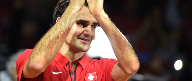 Switzerland's Roger Federer celebrates after beating France's Richard Gasquet at the Davis Cup final between France and Switzerland at Stade Pierre Mauroy in Villeneuve-d'Ascq, northern France, on November 23, 2014. Federer gave Switzerland its first Davis Cup title by defeating Gasquet in straight sets in the first of the final's reverse singles. AFP PHOTO / PHILIPPE HUGUEN (Photo credit should read PHILIPPE HUGUEN/AFP/Getty Images)