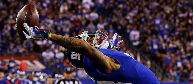 EAST RUTHERFORD, NJ - NOVEMBER 23: Odell Beckham #13 of the New York Giants scores a touchdown in the second quarter against the Dallas Cowboys at MetLife Stadium on November 23, 2014 in East Rutherford, New Jersey. (Photo by Al Bello/Getty Images)
