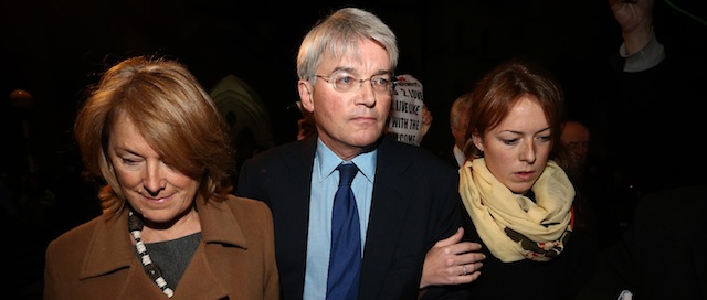LONDON, ENGLAND - NOVEMBER 27: Andrew Mitchell (C), his wife Dr Sharon Bennett (L) and a woman believed to be his daughter (R) leave the High Court on November 27, 2014 in London, England. A judge has ruled that Andrew Mitchell probably did call police officers "plebs", as he ruled against the Tory MP in a High Court libel action. (Photo by Carl Court/Getty Images)