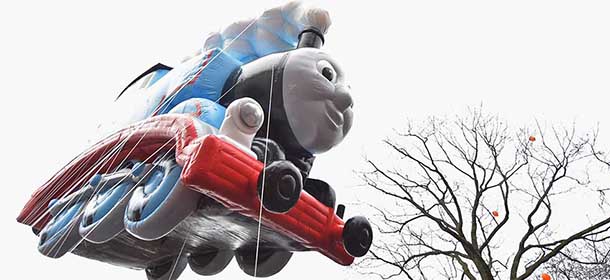 NEW YORK, NY - NOVEMBER 27: The Thomas the Tank Engine balloon passes by during the 88th annThomas the Trainual Macy's Thanksgiving Day Parade on November 27, 2014 in New York City. Over 8,000 people took part in the parade and it is estimated that over three million people were in attendance. (Photo by Michael Loccisano/Getty Images)