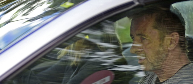 Phil Rudd, the drummer for rock band AC/DC, leaves a court house in Tauranga, New Zealand, Thursday, Nov. 6, 2014, after being charged with attempting to procure murder. The 60-year-old has also been charged with threatening to kill, possession of methamphetamine, and possession of cannabis. (AP Photo/Bay Of Plenty Times via The New Zealand Herald, George Novak) NEW ZEALAND OUT, AUSTRALIA OUT