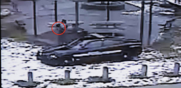 This still image taken from a surveillance video played at a news conference held by Cleveland Police, Wednesday, Nov. 26, 2014, shows Cleveland police officers arriving at Cudell Park on a report of a man with a gun. Twelve-year-old Tamir Rice was fatally shot by a Cleveland police officer Saturday, Nov. 22, 2014, after he reportedly pulled a replica gun at the city park. (AP Photo/Mark Duncan)