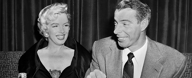 SAN FRANCISCO, UNITED STATES: Picture dated of the fifties showing American actress Marilyn Monroe (L) with her husband baseball legend Joe DiMaggio. (Photo credit should read AFP/AFP/Getty Images)