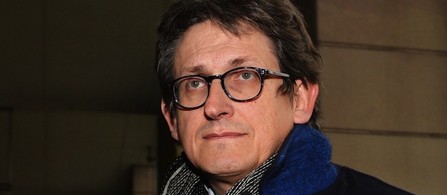 The editor of Britain's Guardian newspaper, Alan Rusbridger, arrives at Portcullis House in London on December 3, 2013, to appear before lawmakers to defend his newspaper's publication of intelligence documents leaked by former US intelligence analyst Edward Snowden. Parliament's home affairs committee is questioning Rusbridger as part of its investigation into counter-terrorism, amid claims the newspaper endangered national security by publishing details of US and British spying. AFP PHOTO/BEN STANSALL (Photo credit should read BEN STANSALL/AFP/Getty Images)