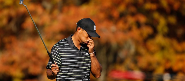 Tiger Woods hits his tee shot on the third hole during the first round the Hero World Challenge at the Isleworth Golf &amp; Country Club on December 4, 2014 in Windermere, Florida. *** Local Caption *** Tiger Woods