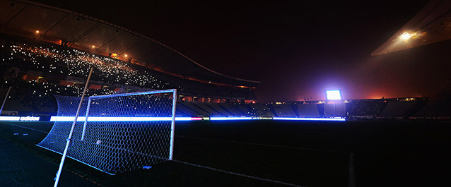 ISTANBUL, TURKEY - DECEMBER 11: Fans shine lights from mobile phones as play is suspended following a floodlight failure during the UEFA Europa League Group C match between Besiktas JK and Tottenham Hotspur FC at Ataturk Olympic Stadium on December 11, 2014 in Istanbul, Turkey. (Photo by Jamie McDonald/Getty Images)