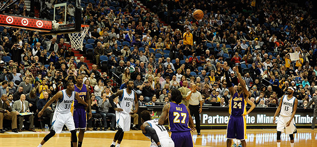 MINNEAPOLIS, MN - DECEMBER 14: Kobe Bryant #24 of the Los Angeles Lakers shoots a free throw to pass Michael Jordan on the all-time scoring list during the second quarter of the game on December 14, 2014 at Target Center in Minneapolis, Minnesota. NOTE TO USER: User expressly acknowledges and agrees that, by downloading and or using this Photograph, user is consenting to the terms and conditions of the Getty Images License Agreement. (Photo by Hannah Foslien/Getty Images)