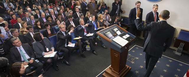 President Barack Obama waves to reporters at the conclusion of his news conference in the Brady Press Briefing Room of the White House in Washington, Friday, Dec. 19, 2014. The president claimed an array of successes in 2014, citing lower unemployment, a rising number of Americans covered by health insurance, and an historic diplomatic opening with Cuba. He also touts his own executive action and a Chinese agreement to combat global warming. (AP Photo/Pablo Martinez Monsivais )