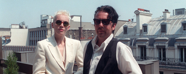 British musicians Annie Lennox, left, and Dave Stewart of the Eurythmics pose on the terrace of a hotel in Paris, France, Tuesday, July 25, 1989. They held a news conference to promote their new LP "We Too Are One." (AP Photo/Laurent Rebours)