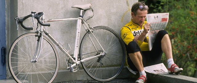 12 Oct 1996: A keen cyclist reads the newspaper during the World Road Cycling Championships in Lugano, Switzerland. Mandatory Credit: Anton Want/Allsport
