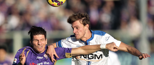 FLORENCE, ITALY - DECEMBER 21: Mario Gomez of ACF Fiorentina battles for the ball with Daniele Rugani of Empoli FC during the Serie A match betweeen ACF Fiorentina and Empoli FC at Stadio Artemio Franchi on December 21, 2014 in Florence, Italy. (Photo by Gabriele Maltinti/Getty Images)