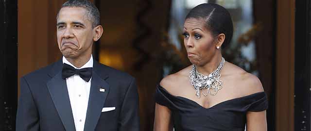President Barack Obama and first lady Michelle Obama wait to welcome Britain's Queen Elizabeth II and Prince Philip for a reciprocal dinner at Winfield House in London, Wednesday, May 25, 2011. (AP Photo/Charles Dharapak)