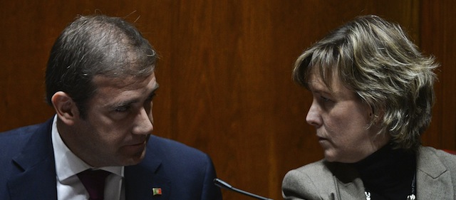 Portuguese Prime Minister Pedro Passos Coelho (L) speaks with Portuguese Finance Minister Maria Luis Albuquerque (R) during the closing session and a final vote of the 2015 state budget at the Portuguese parliament in Lisbon on November 25, 2014. AFP PHOTO / PATRICIA DE MELO MOREIRA (Photo credit should read PATRICIA DE MELO MOREIRA/AFP/Getty Images)