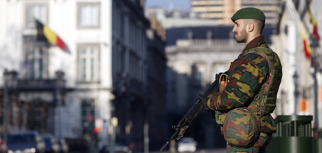 A Belgian soldier stands gyard outside the US Embassy in Brussels on January 17, 2015 after security forces smashed a suspected Islamist "terrorist" cell planning to kill police officers. Up to 300 soldiers will be progressively deployed in the capital Brussels and the northern city of Antwerp, which has a large Jewish population, Prime Minister Charles Michel's office said in a statement. Security forces early on January 16 killed two suspected Islamists in a huge raid in the eastern city of Verviers on an alleged jihadist cell planning to attack police in the country, and police arrested 13 people during a series of following raids across Belgium. AFP PHOTO / BELGA / NICOLAS MAETERLINCK **Belgium Out** (Photo credit should read NICOLAS MAETERLINCK/AFP/Getty Images)