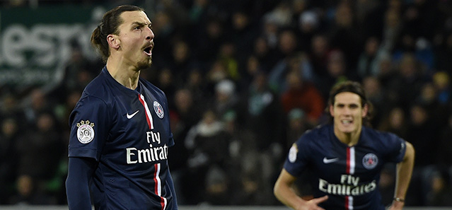 Paris Saint-Germain's Swedish midfielder Zlatan Ibrahimovic (L) reacts next to Paris Saint-Germain's Uruguyan forward Edinson Cavani (R) after scoring a penalty kick during the French L1 football match AS Saint-Etienne against Paris Saint-Germain on January 25, 2015 at the Geoffroy Guichard stadium in Saint-Etienne, Central France. AFP PHOTO / PHILIPPE DESMAZES (Photo credit should read PHILIPPE DESMAZES/AFP/Getty Images)