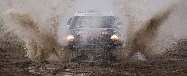 Mini driver Boris Garafulic of Chile and co-pilot Filipe Palmeiro of Portugal race during the third stage of the Dakar Rally 2015 between the cities of San Juan and Chilecito, Argentina, Tuesday, Jan. 6, 2015. The race will finish on Jan. 17, passing through Bolivia and Chile and returning to Argentina. (AP Photo/Felipe Dana)