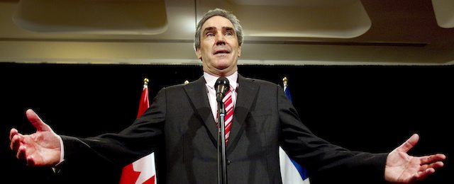 Liberal Party leader Michael Ignatieff speaks to reporters while campaigning Sunday, March 27, 2011 in Montreal. (AP Photo/The Canadian Press, Ryan Remiorz)